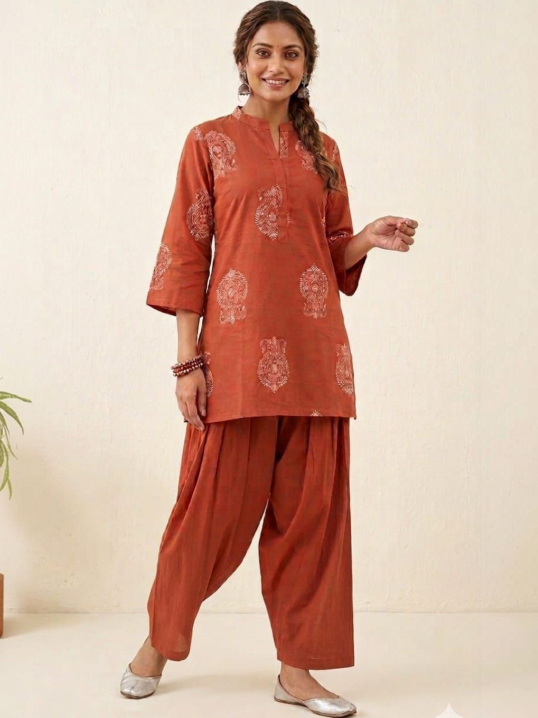 Women Rust Orange Ethnic Motif Printed Kurta With Farshi Salwar